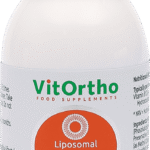 A white plastic bottle of VitOrtho Liposomal Vitamin B12 liquid food supplements with a ribbed white plastic cap and a prominent orange circular label on the front.