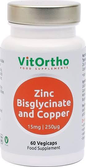A white plastic bottle of VitOrtho Zinc Bisglycinate and Copper food supplements with a silver cap and a prominent orange circular label on the front.
