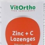 A white plastic bottle of VitOrtho Zinc plus C Lozenges food supplements with a matte silver cap and a prominent orange circular label on the front.